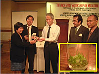 Exchange of experimental materials of orchid at the Workshop in 2003